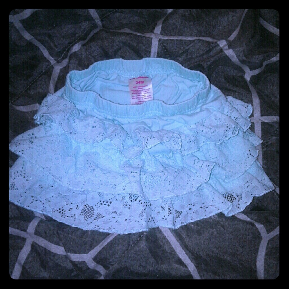 24 Month Green Lace Skirt with a floral Pattern